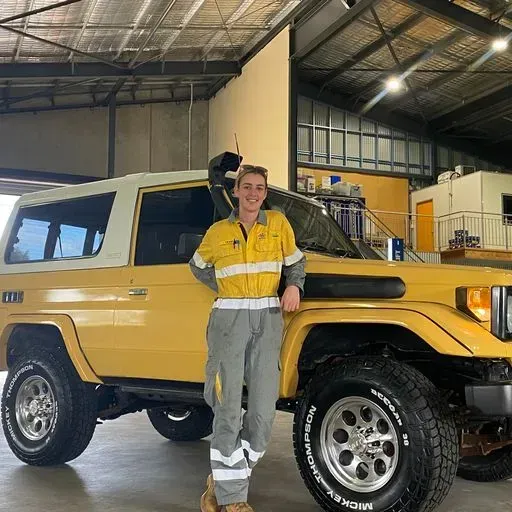 Woman and a Yellow Car — Beaudesert, QLD — Beaudesert Tyre Store