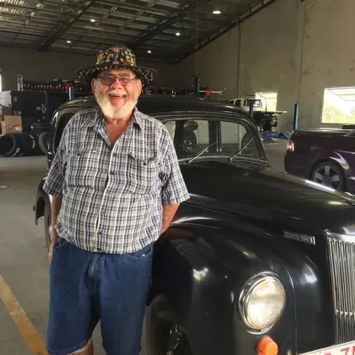 Senior Man and a Black Vintage Car — Beaudesert, QLD — Beaudesert Tyre Store