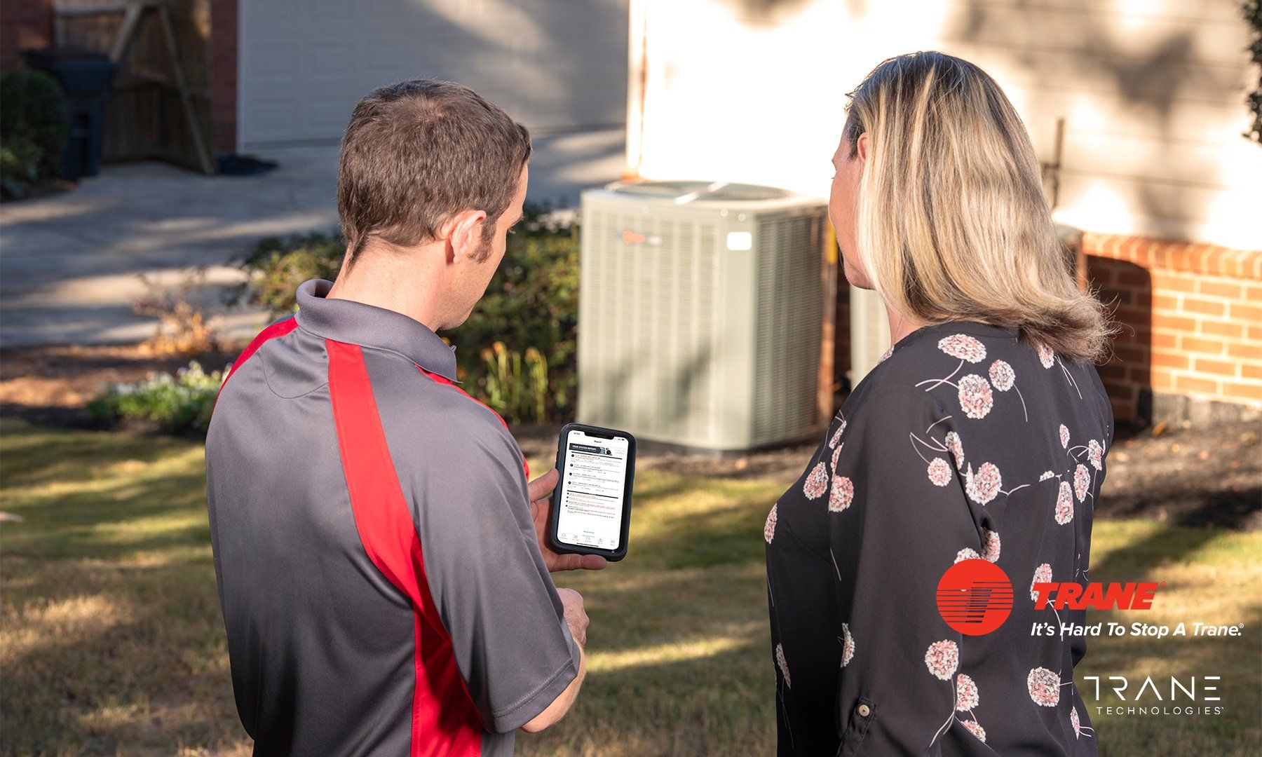 Technician Installing Air Conditioner — Chelan, WA — Cascade Mechanical