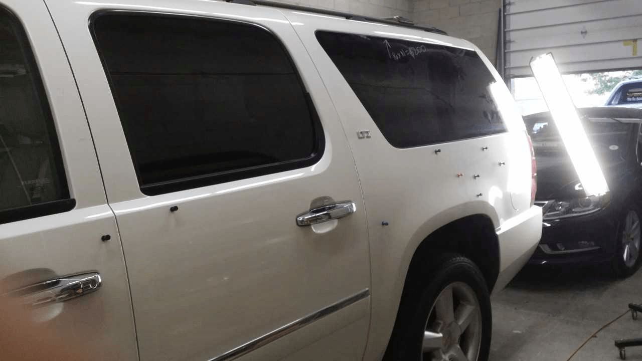 Hail Damage Repair — Hail Dents of a Van in Centennial, CO