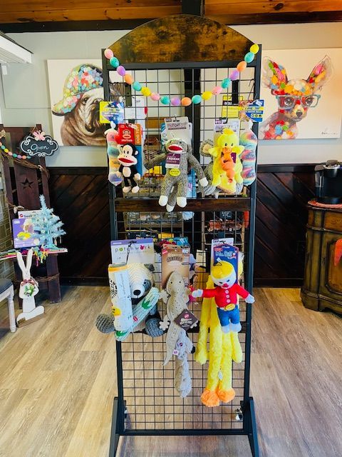 A display of stuffed animals and toys in a store