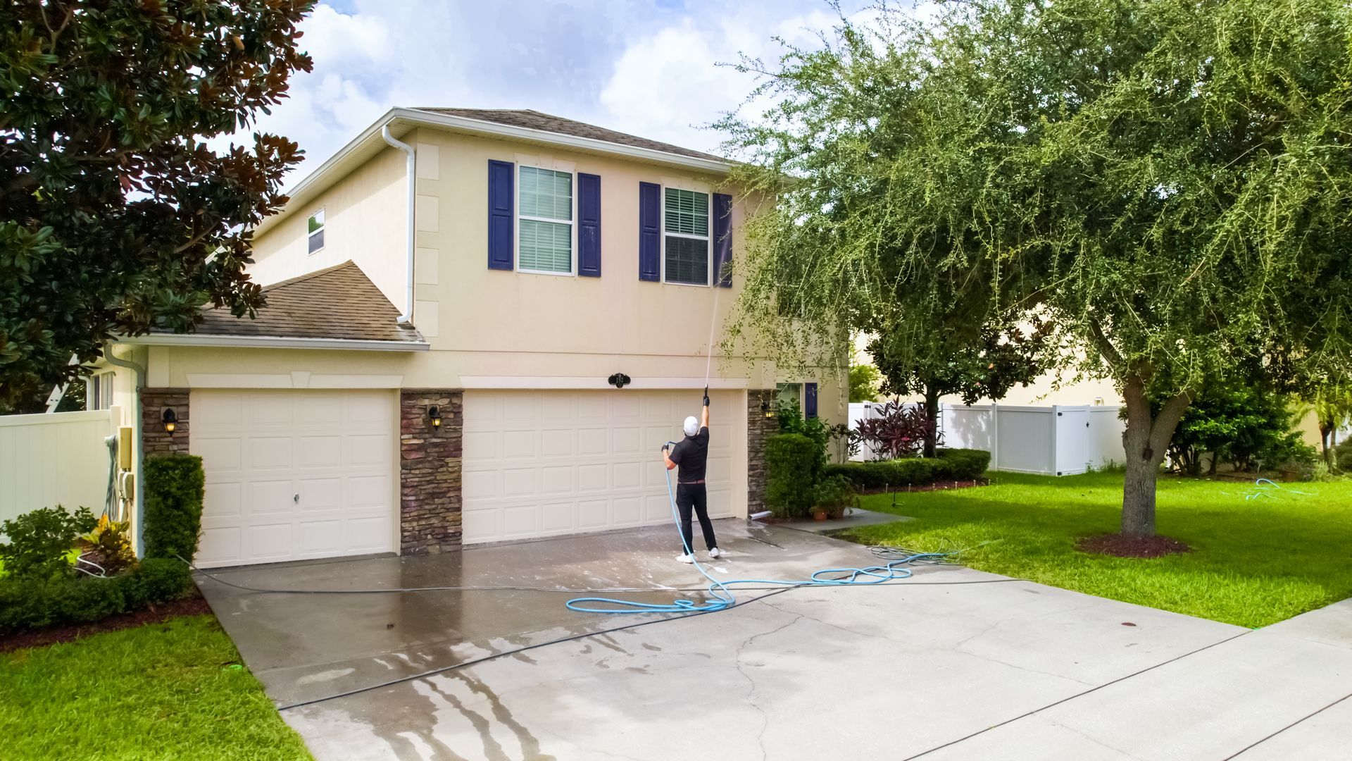 Soft wash outside a home.