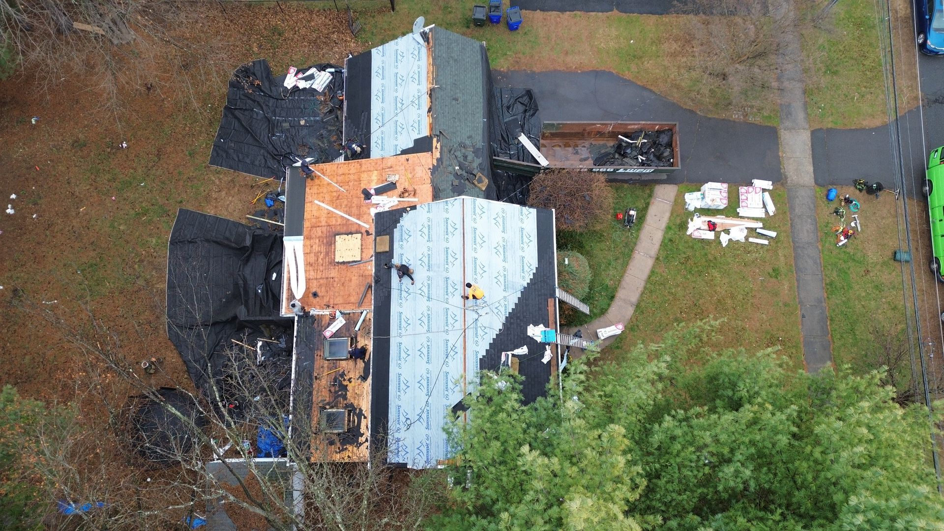 An aerial view of a house that is being remodeled.