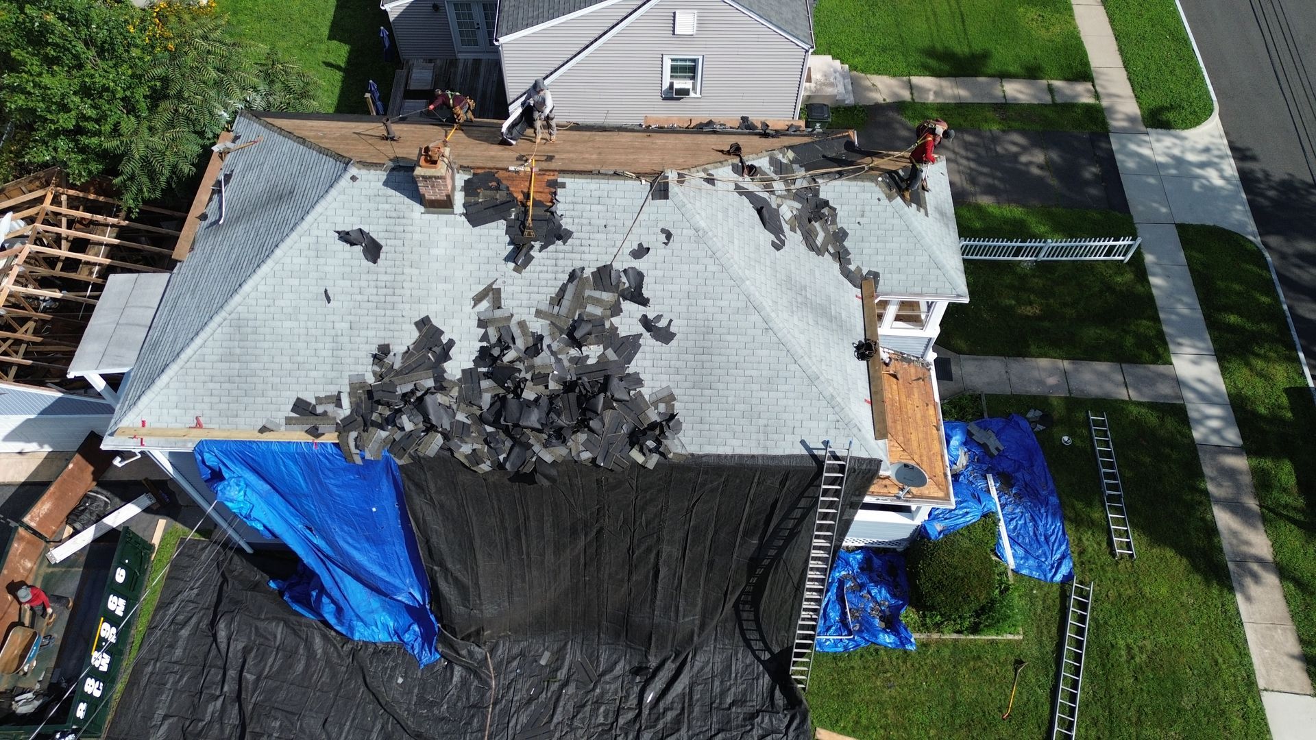 An aerial view of a house that is being remodeled.