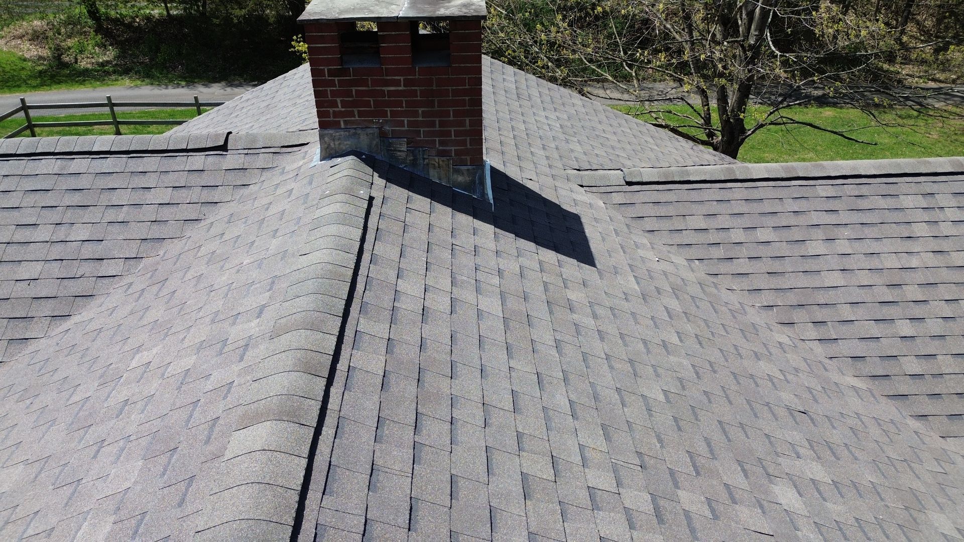 A roof with a chimney on top of it