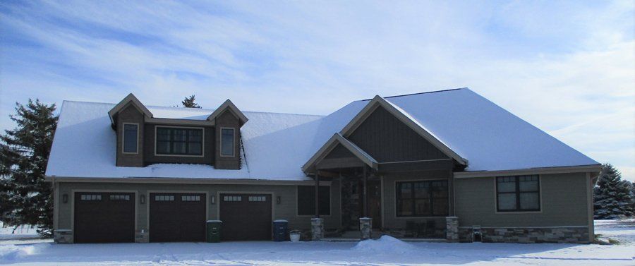 House Roof Covered with Snow — Sheridan, WY — Clemens Exteriors Inc
