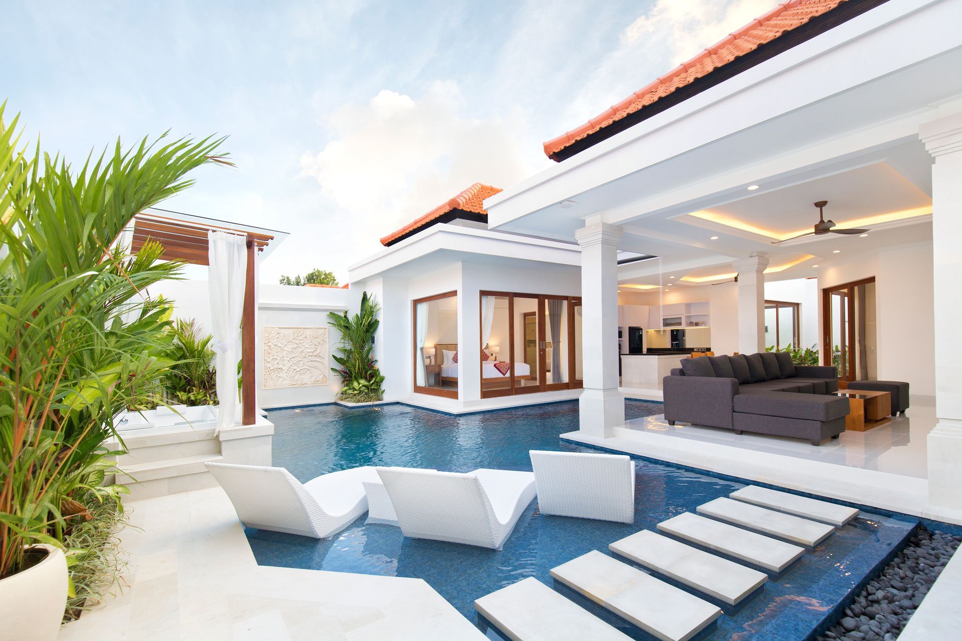 Large pool, living room and jacuzzi at Villa Tirta