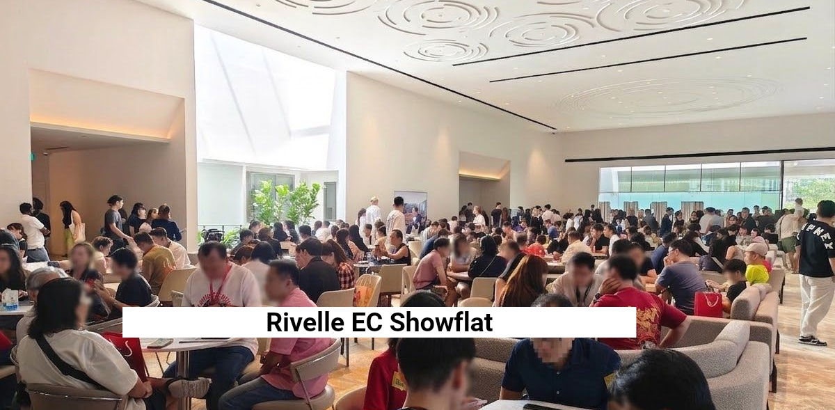 A modern outdoor pool and water playground set within a lushly landscaped residential development.