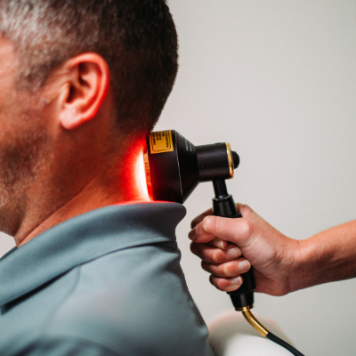 Woman gets neck pain laser treatment