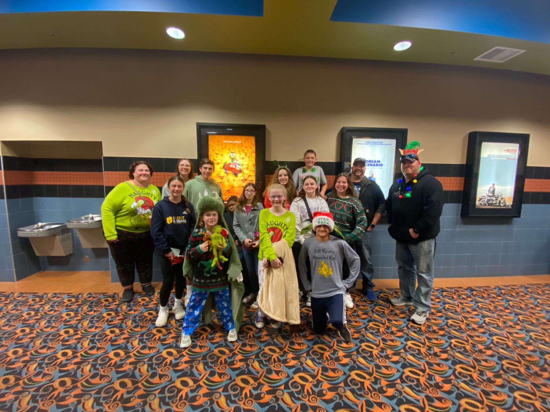Youth group and families attending a movie.