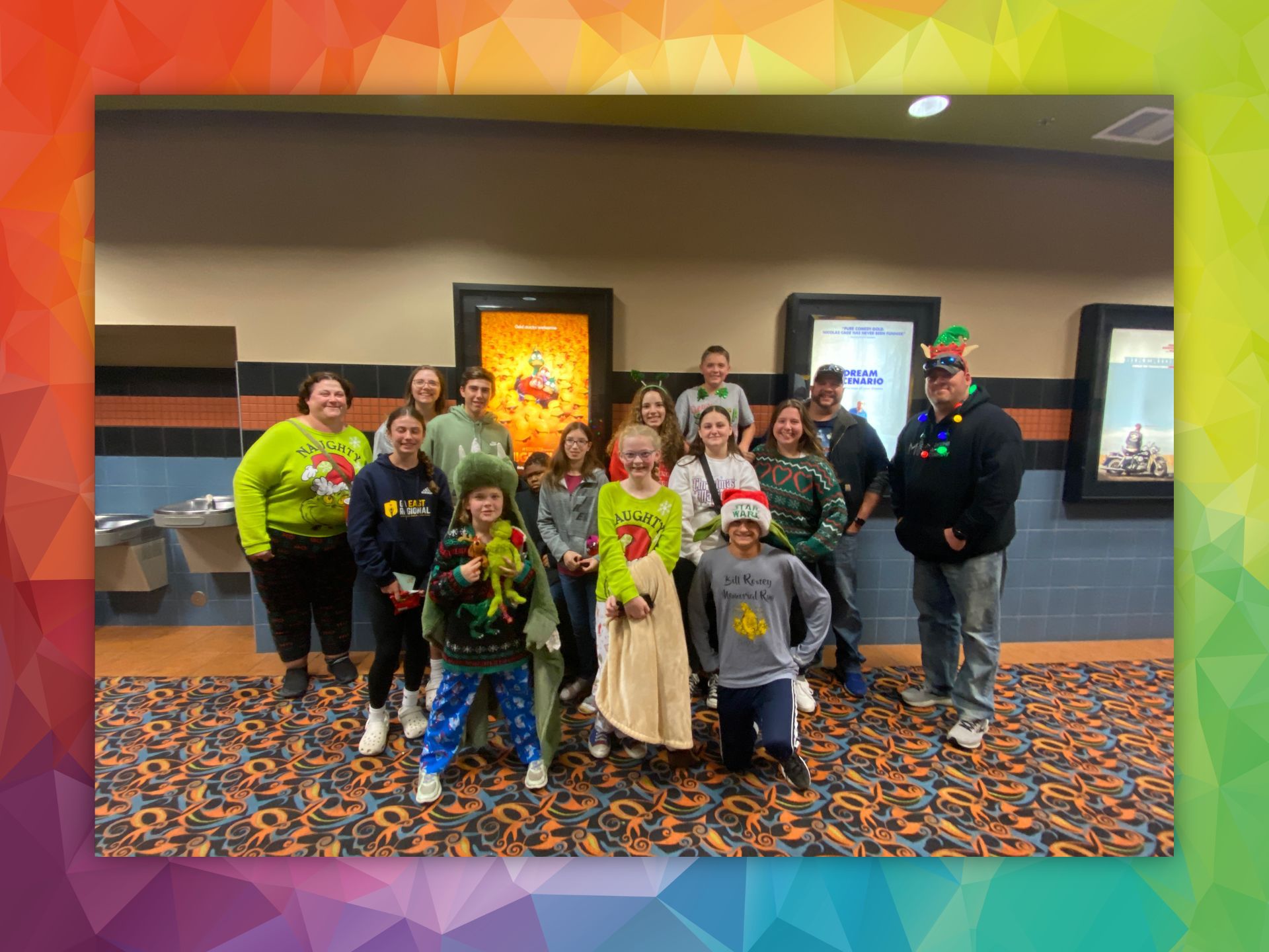 Youth Group members enjoying a movie event at a local theater.