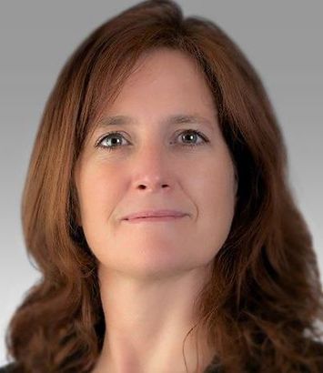 Image of woman's face with brown hair.