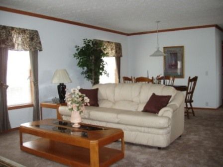 A living room with a couch and a coffee table