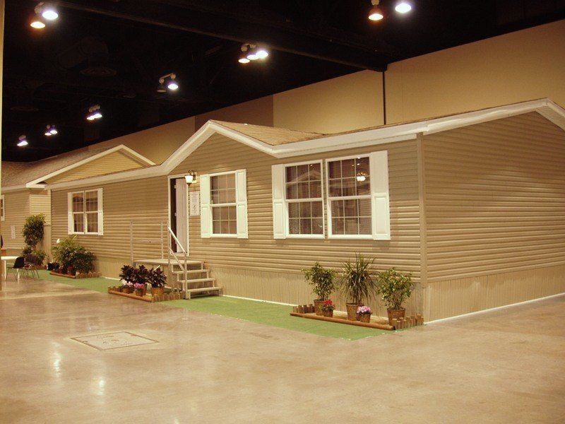 A house with a lot of windows and stairs