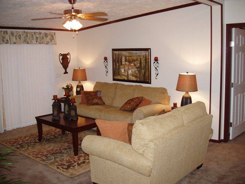 A living room with a couch and a coffee table