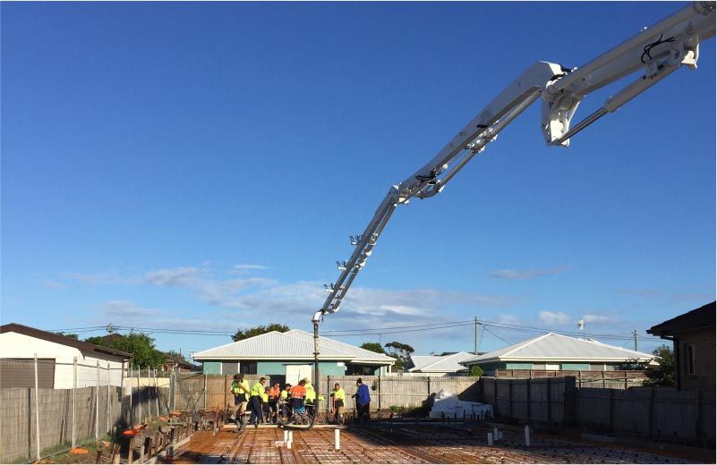 Workers And Concrete Mixer Truck — Easy Mix Concrete in Berkeley Vale, NSW
