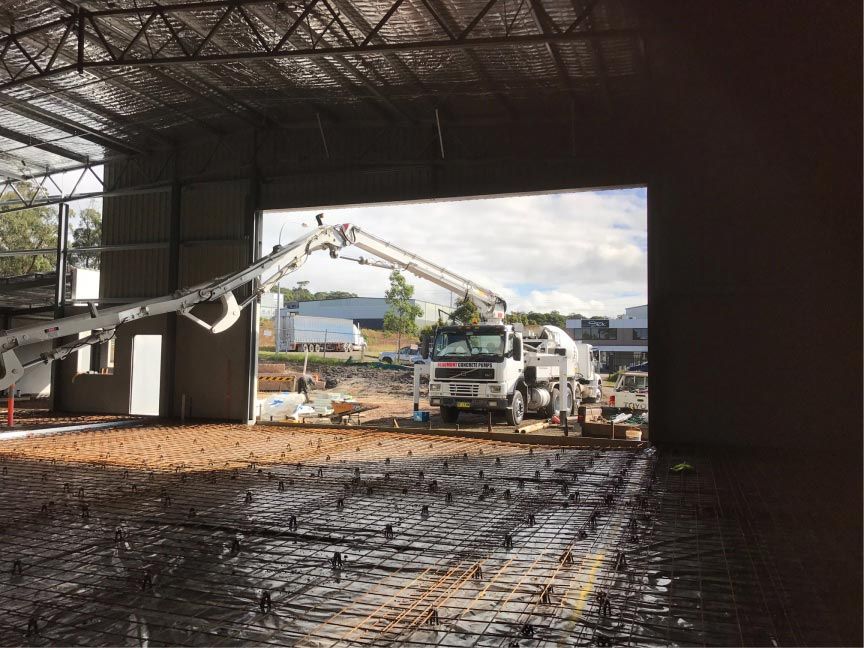 Concrete Truck In Building Other — Easy Mix Concrete in Erina, NSW