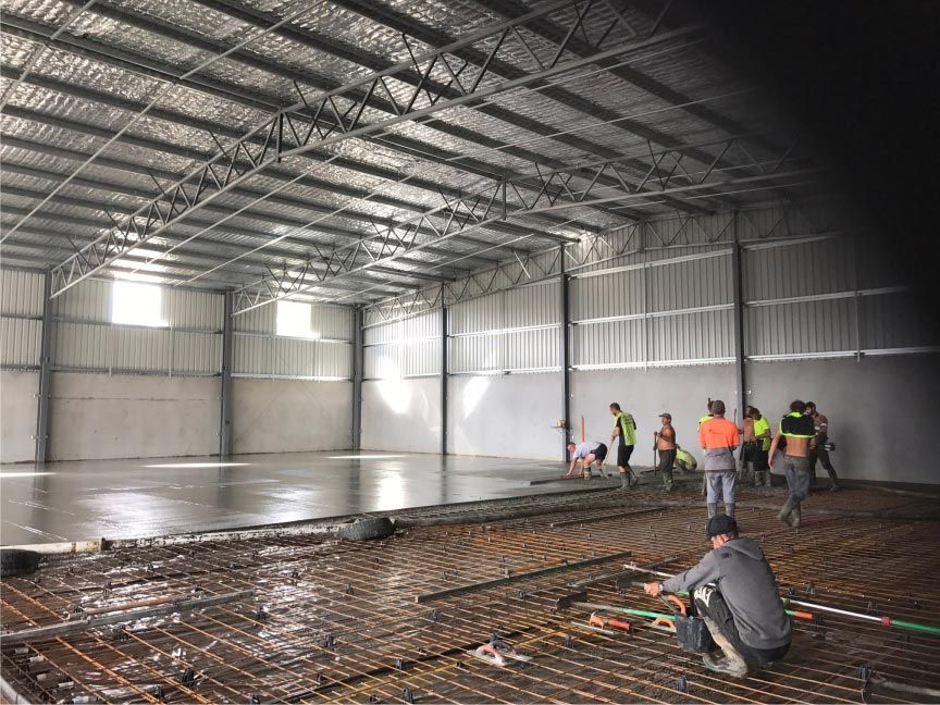 All Men Work Concrete In Building — Easy Mix Concrete in Berkeley Vale, NSW