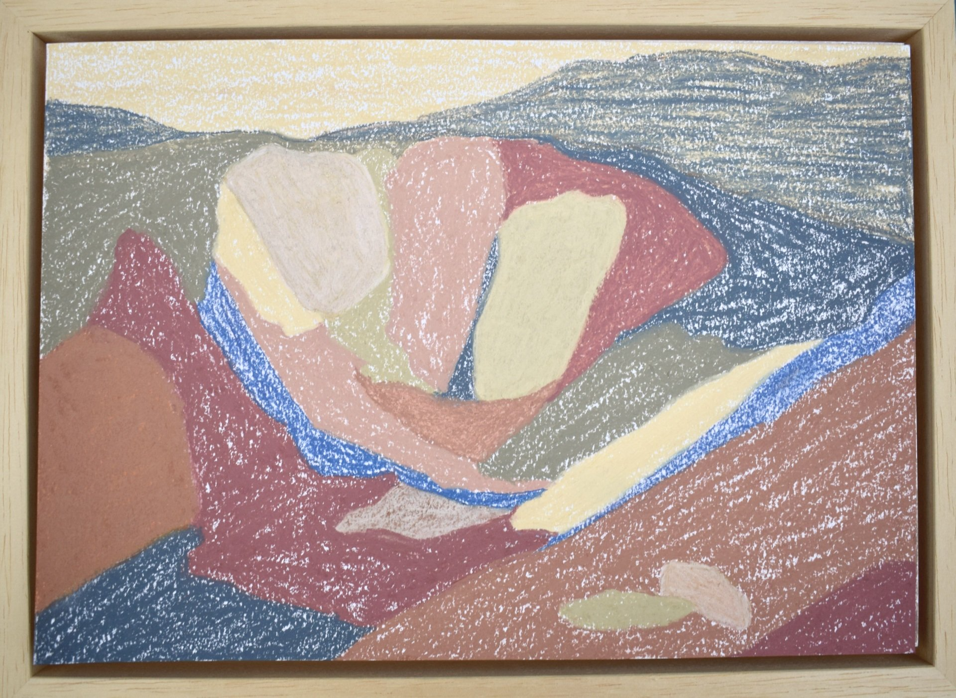 Image of artist drawing of abstract landscape with round forms in red, yellow and blue