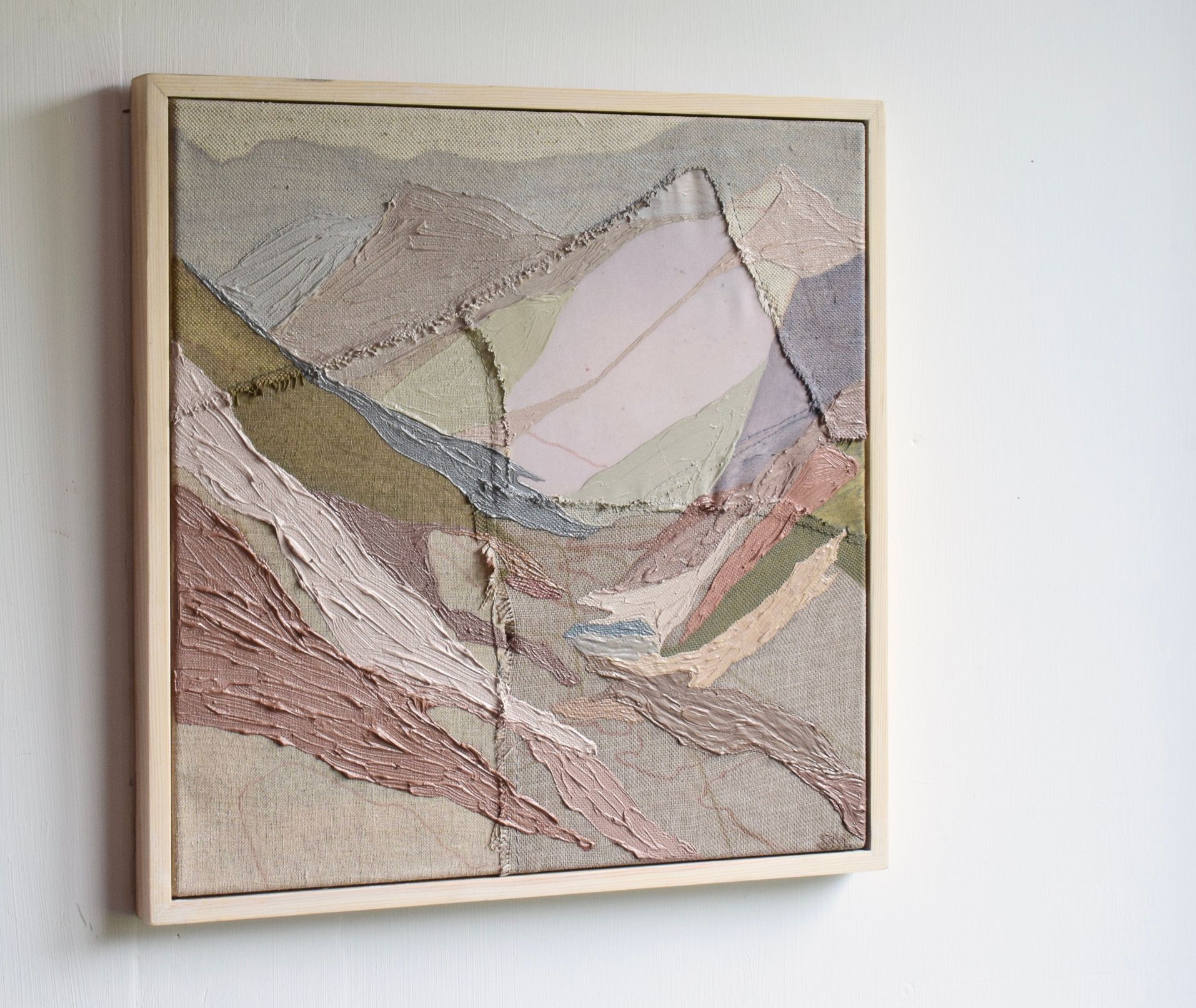 Photo of colourful abstract painting on white wall