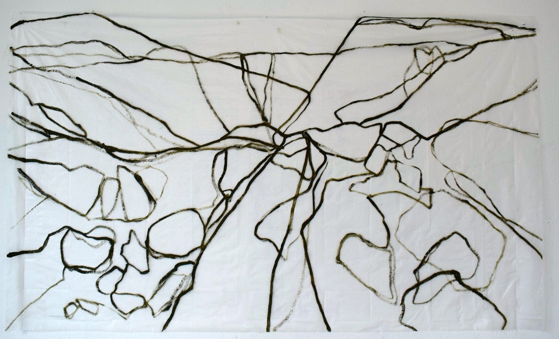 Large abstract landscape drawing. Green paint on clear background