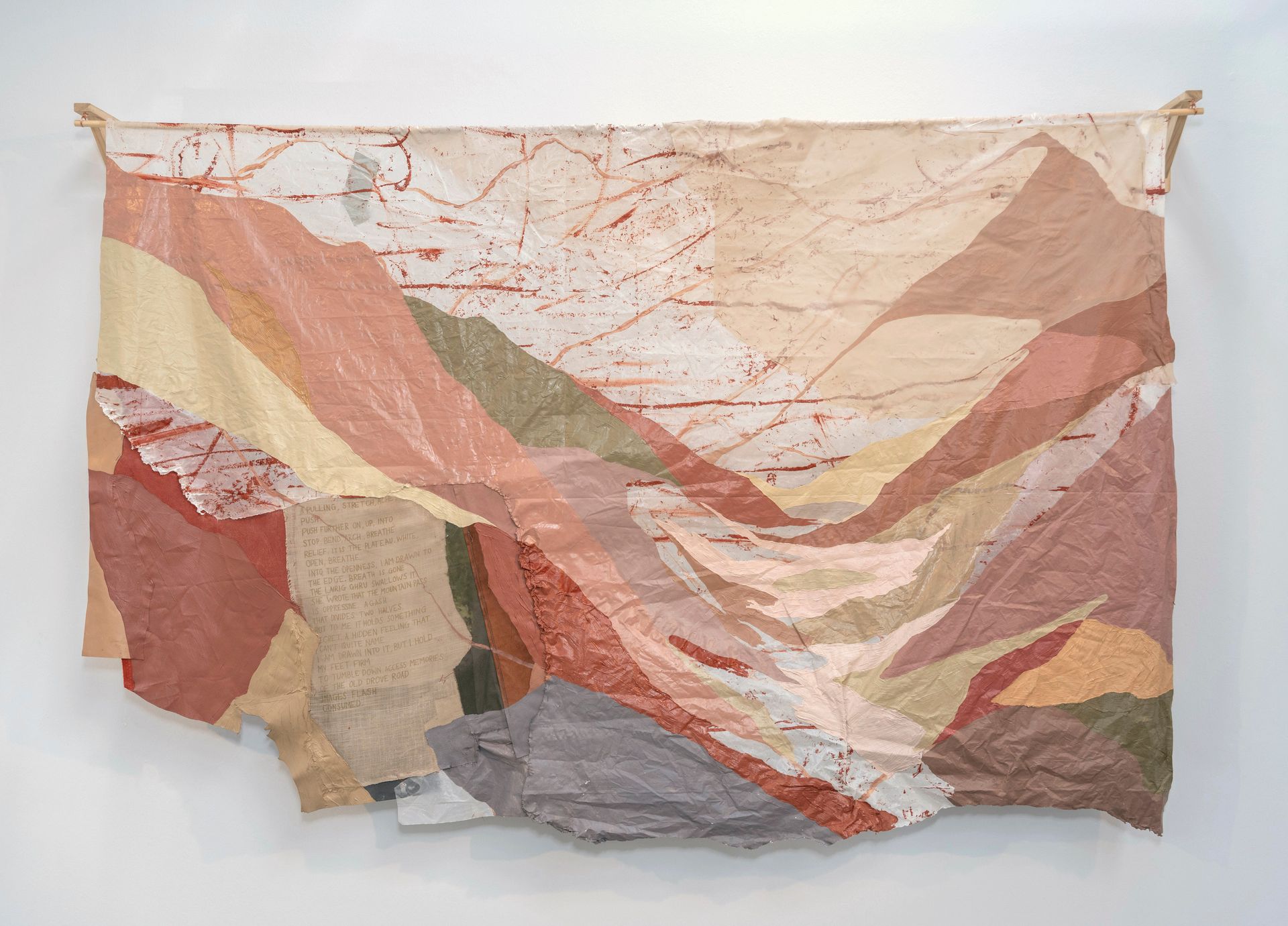 Photo of painting on white wall with wooden border