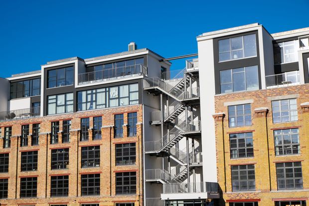 A building with a fire escape on the side of it