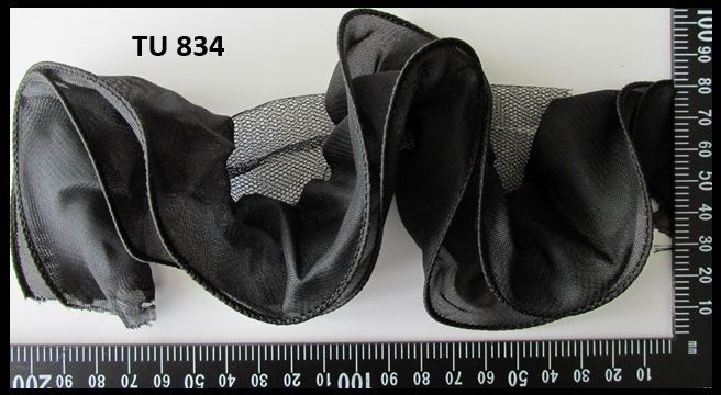 A ruler with the number tu 834 on it