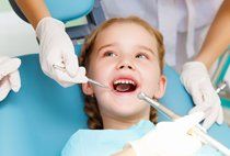 The Girl Having Her Teeth Check — Dentistry in Colorado Springs, CO