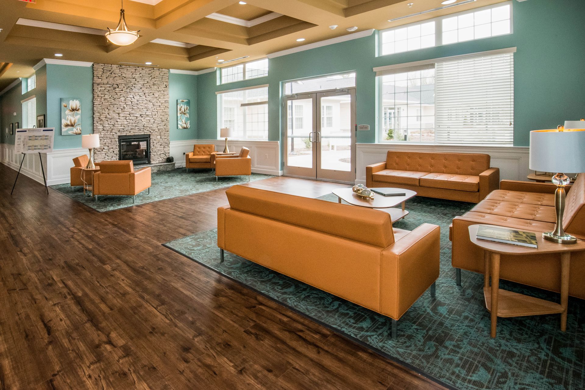 A living room filled with furniture and a fireplace.