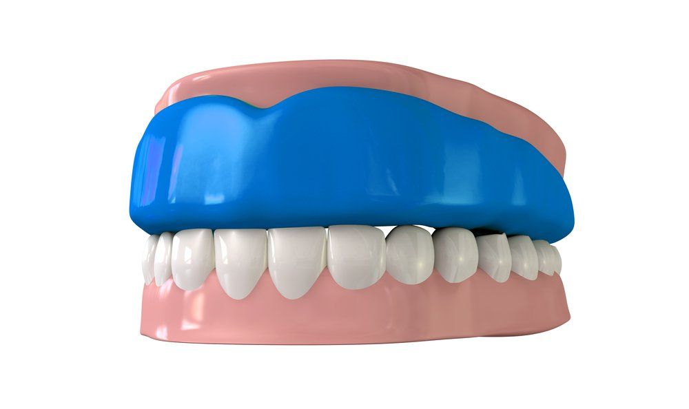 Dental Implant And Crowns On Table