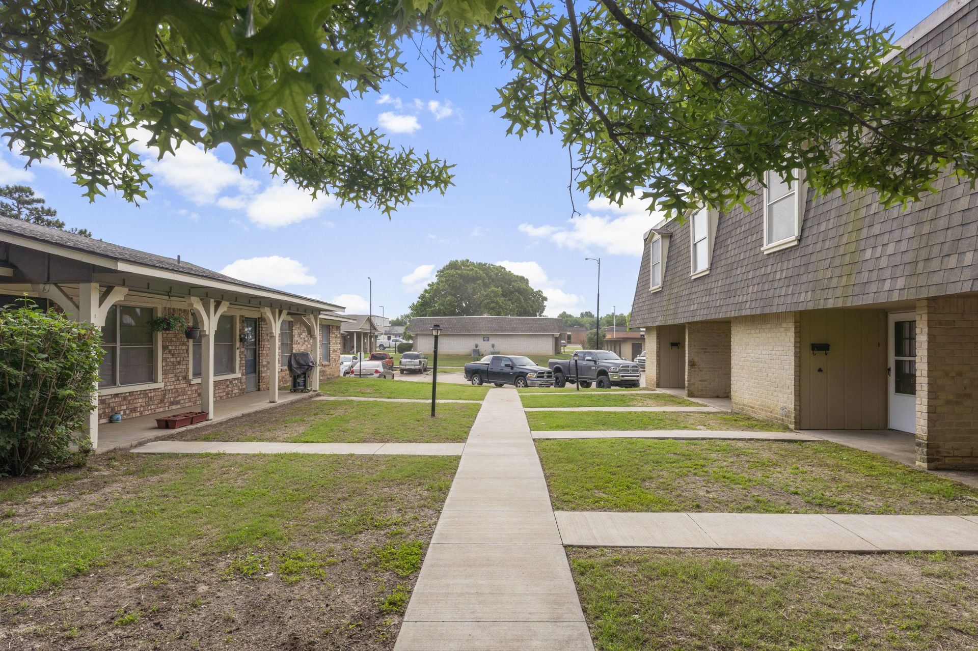 A row of houses with a walkway between them