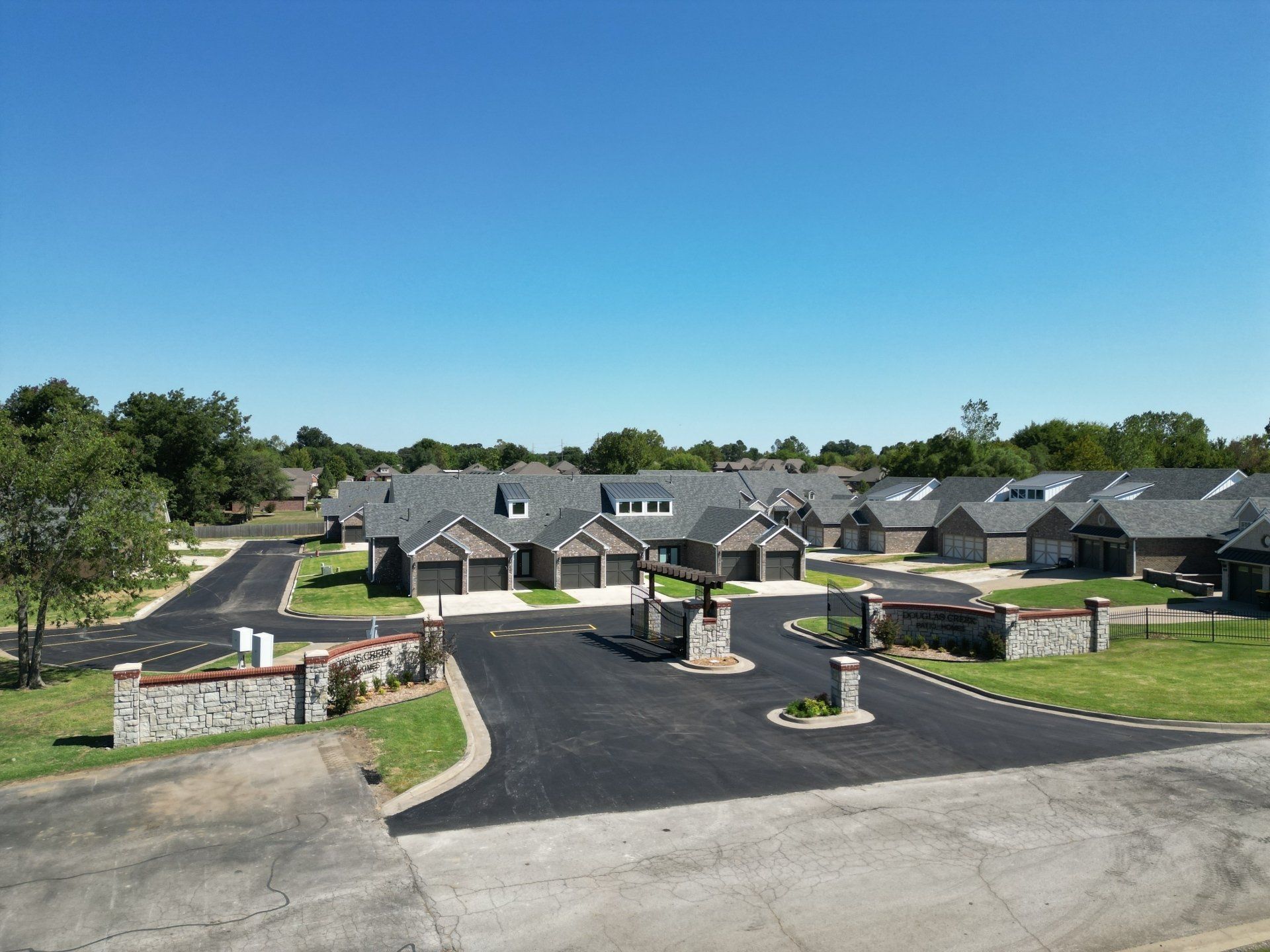An aerial view of a residential area with a lot of houses
