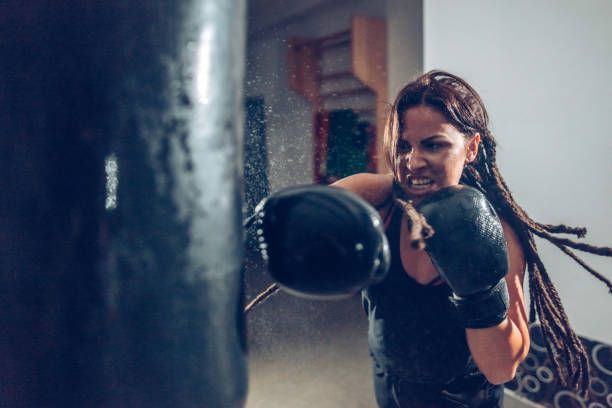 Woman Doing Boxing — Islip Terrace, NY — Ripped and Ready Training/Recovery Systems