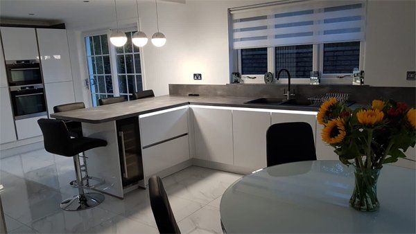 kitchen with modern lighting and flowers
