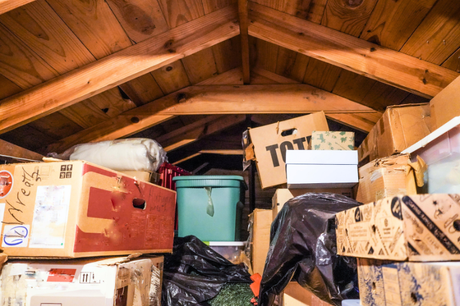 attic filled with boxes and junk 