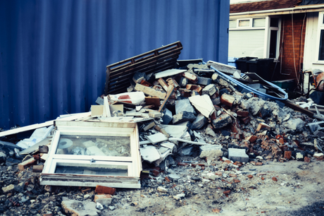 pile of broken concrete and broken window