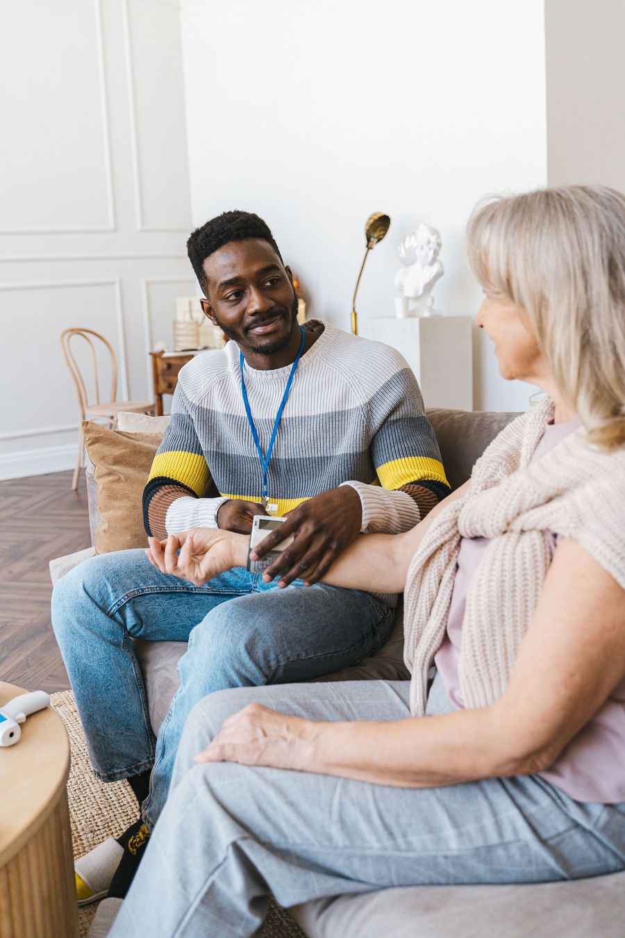 Caregiver assisting client at home