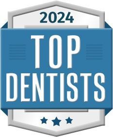 2024 Top Dentists badge in blue, white, and gray with three stars