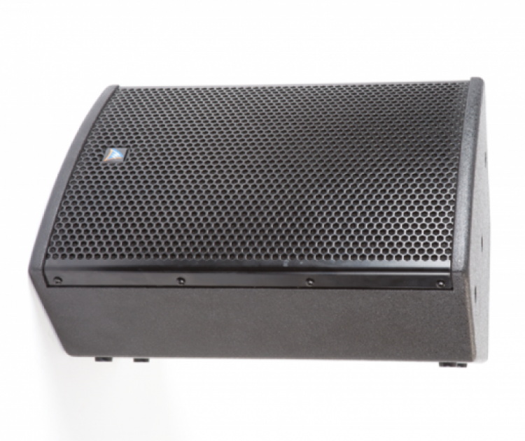 A jbl speaker is sitting on a white surface