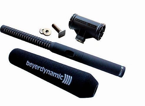A beyerdynamic microphone is sitting on a white surface.
