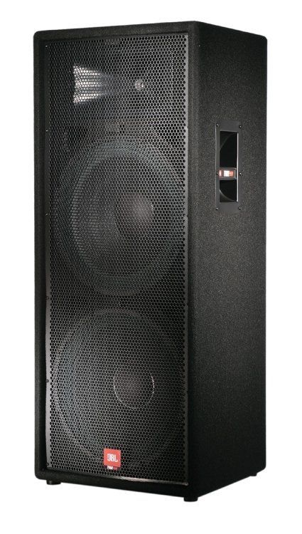A jbl speaker is sitting on a white surface