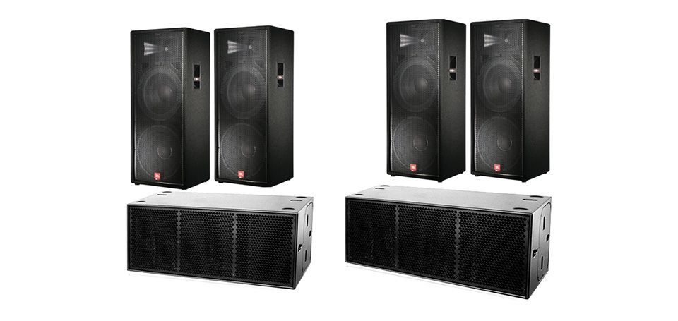 A group of speakers sitting on top of each other on a white background.