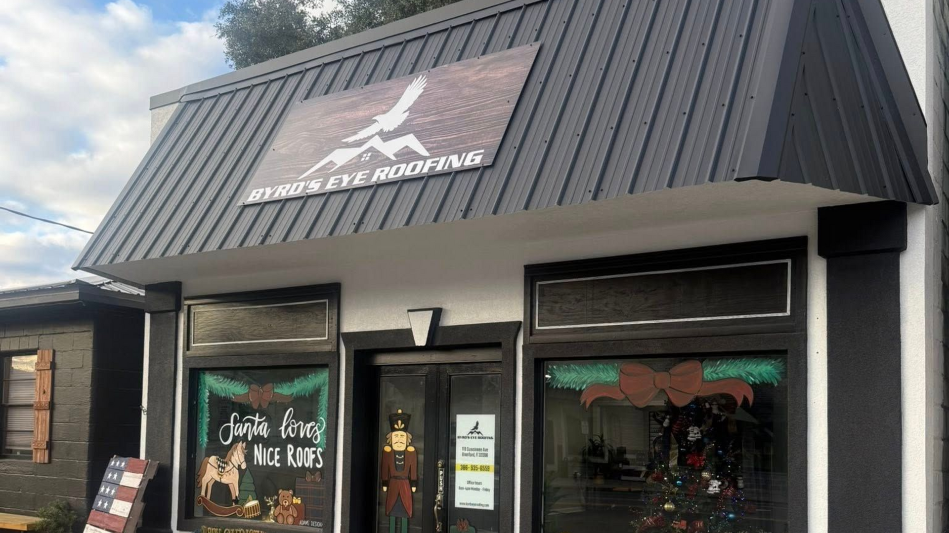 A roofing contractor inspecting a roof in Lake City, FL.