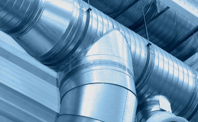 Silver HVAC ductwork in a building, with a 