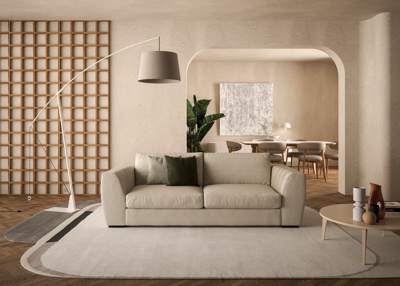 beige sofa, arched floor lamp, and round coffee table