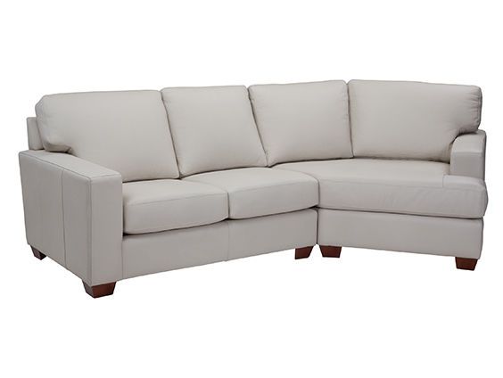 Cream colour sectional sofa with three cushions