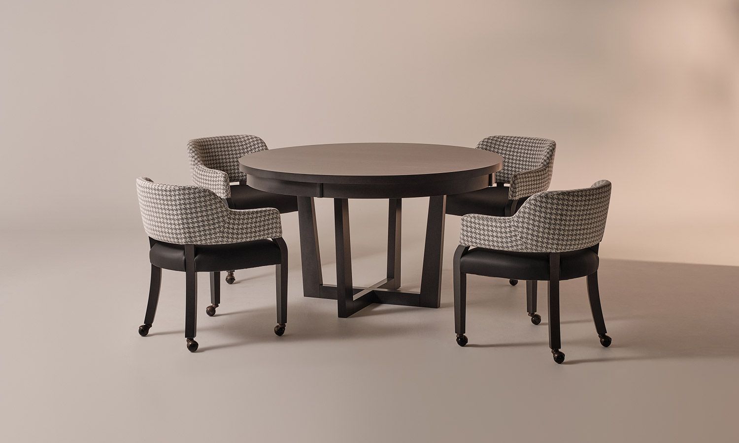 A round table with four chairs around it