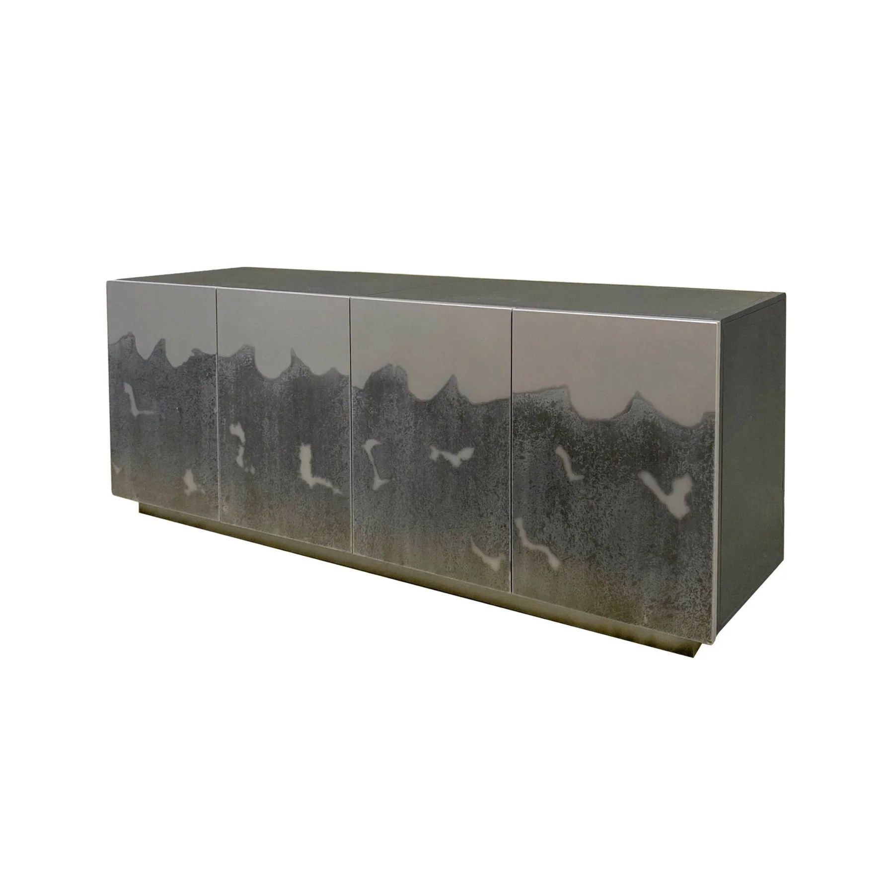Silver credenza with wave like design on the doors