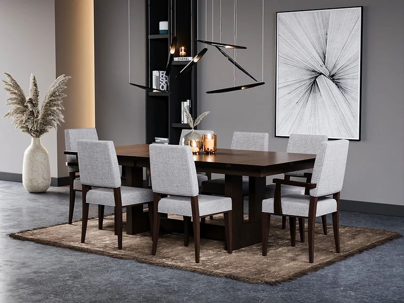 A dining room with a table and chairs and a picture on the wall.